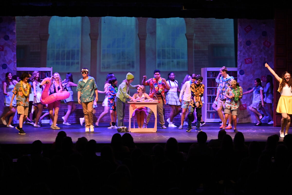 Cast of Legally Blonde performing onstage