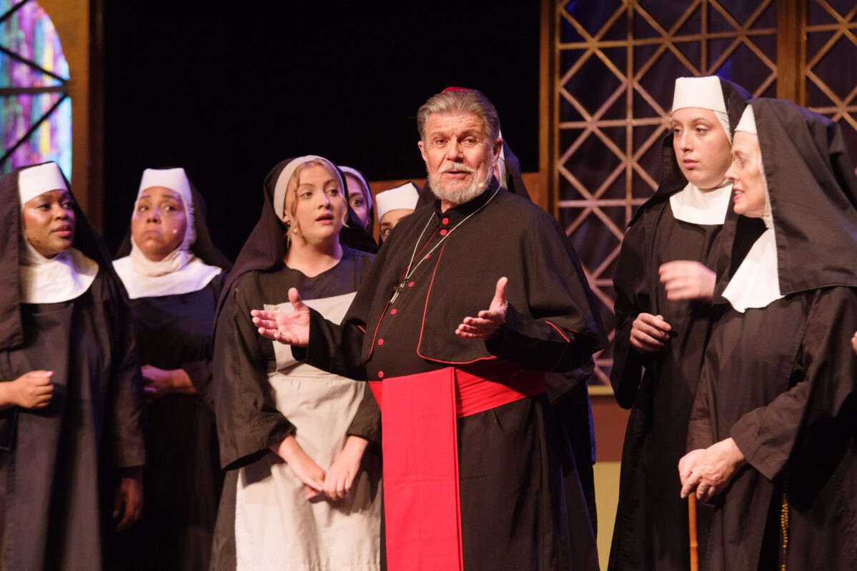 cast of Sister Act performing onstage