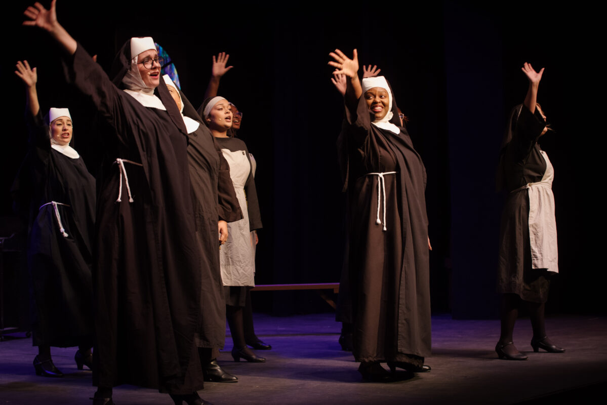 cast of Sister Act performing onstage